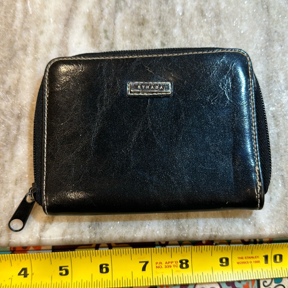Strada Black Leather soft w/white stitching zipper change and flanked by pockets